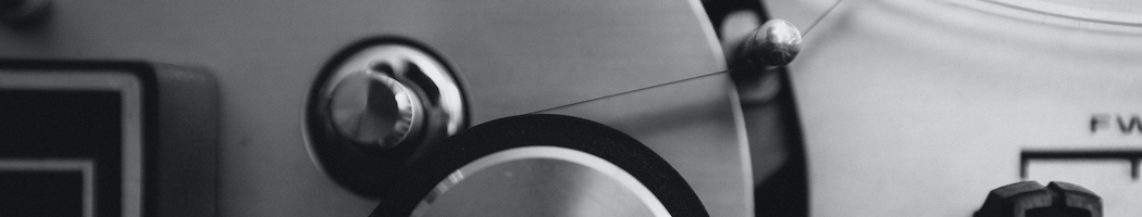 black and white close up of part of a reel-to-reel for audio tape